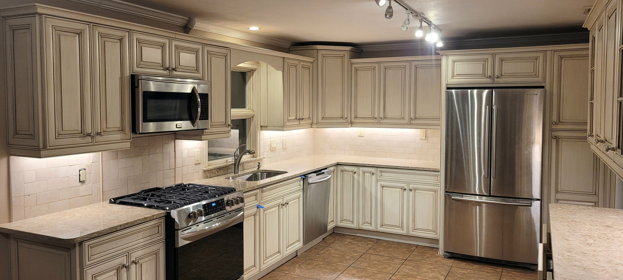 Cabinet refinishing — kitchen