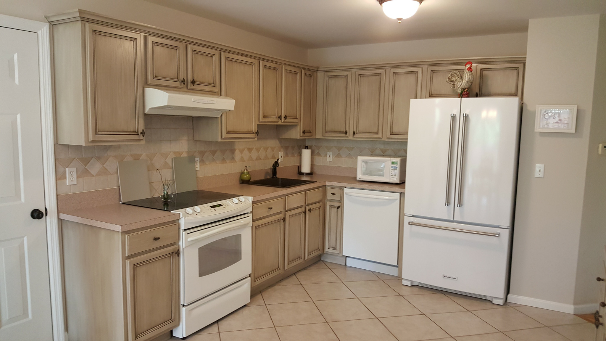 Cabinet refinishing — full kitchen